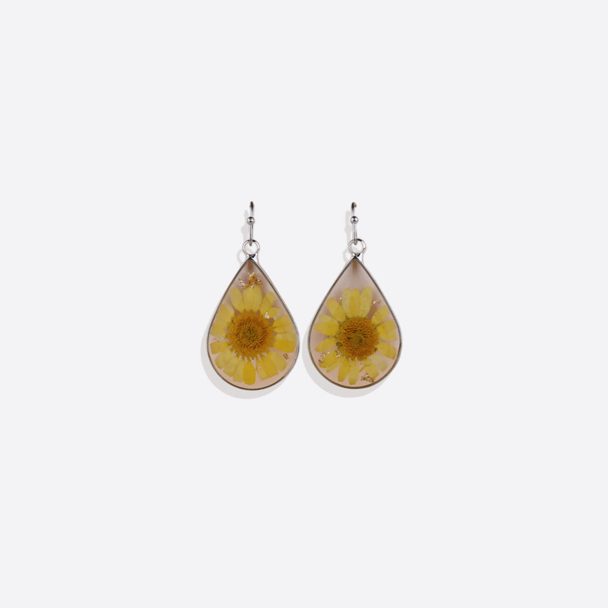 Boucles d'oreilles en fleurs de naissance pressées
