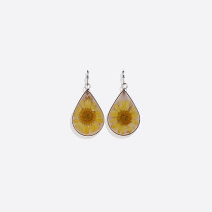 Boucles d'oreilles en fleurs de naissance pressées