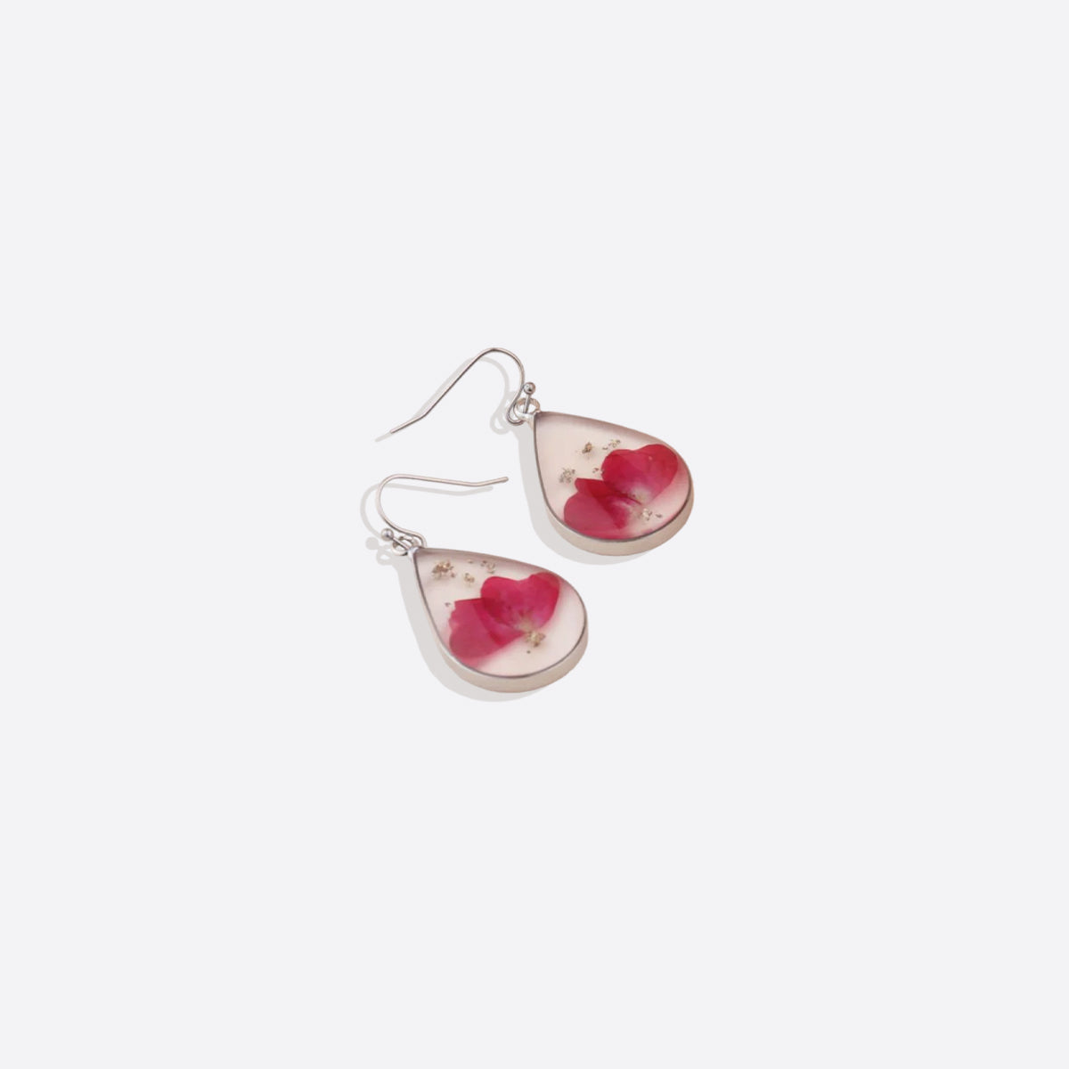 Boucles d'oreilles en fleurs de naissance pressées