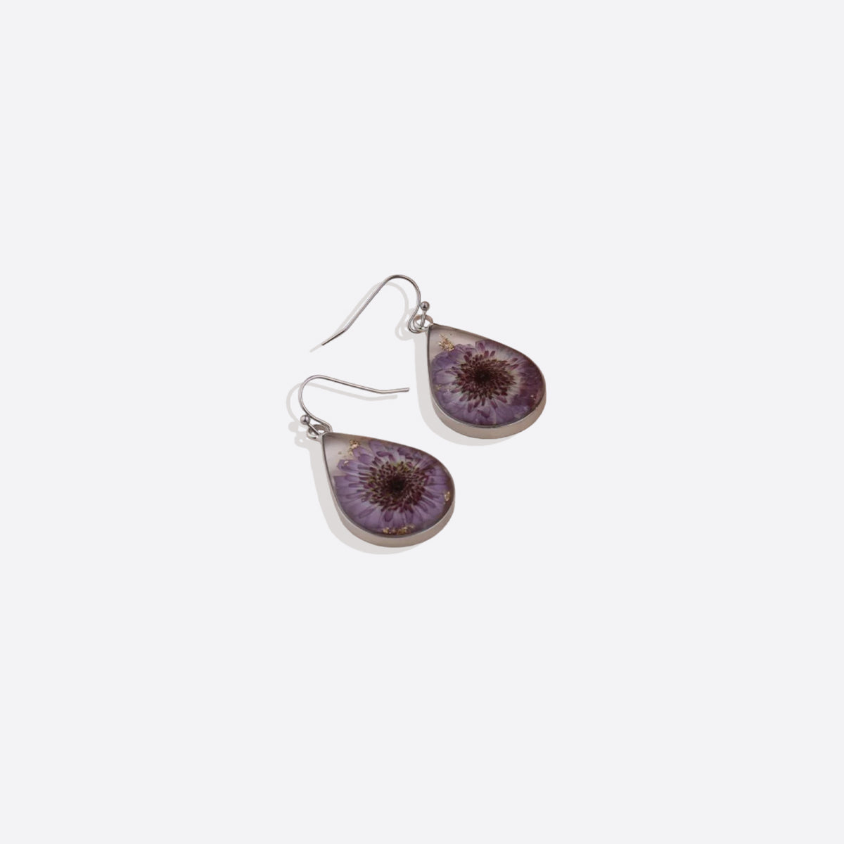 Boucles d'oreilles en fleurs de naissance pressées