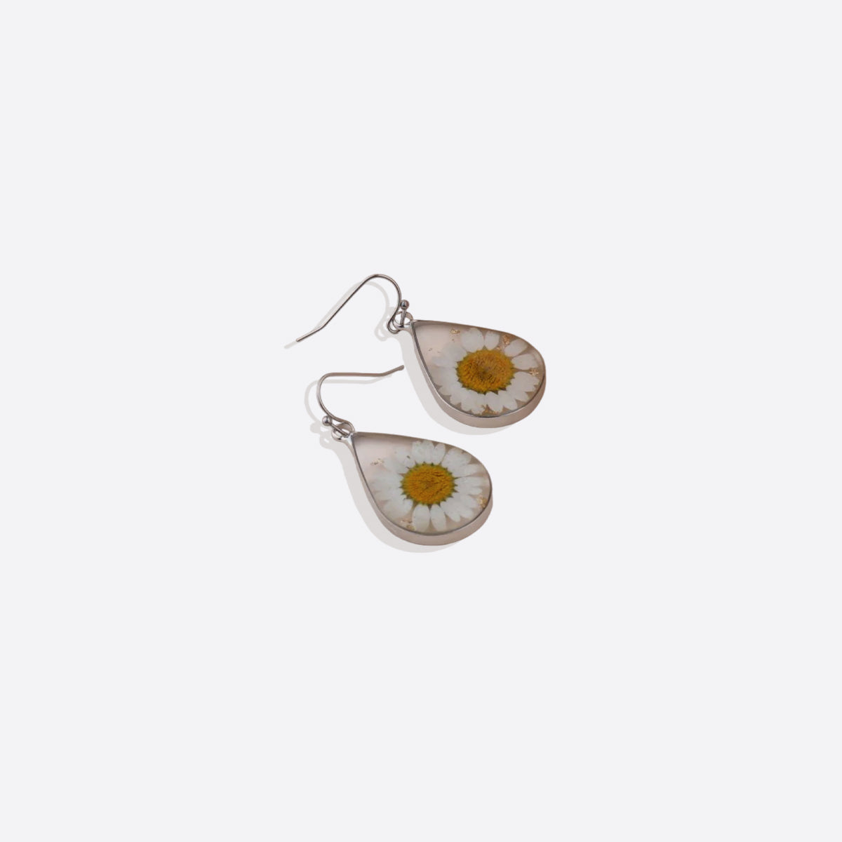 Boucles d'oreilles en fleurs de naissance pressées