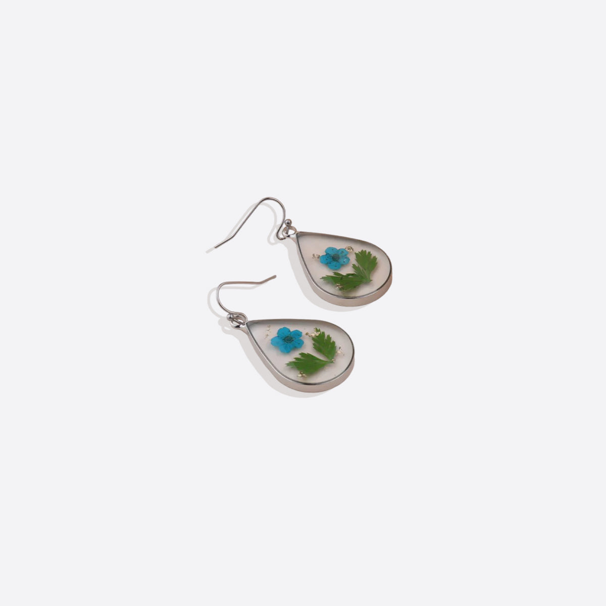 Boucles d'oreilles en fleurs de naissance pressées