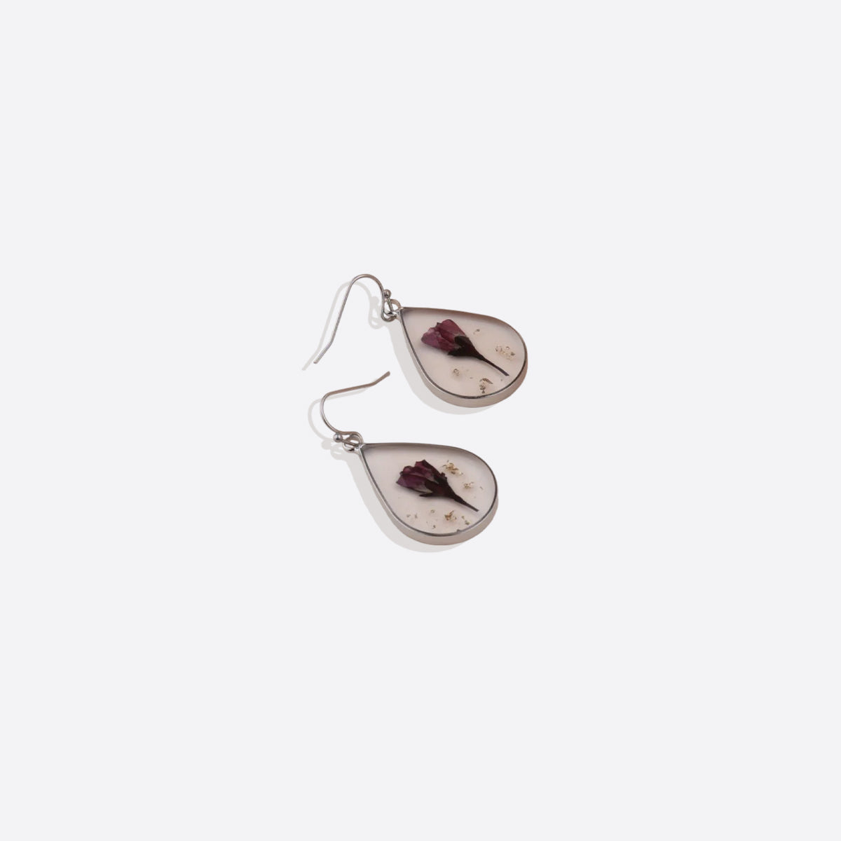 Boucles d'oreilles en fleurs de naissance pressées