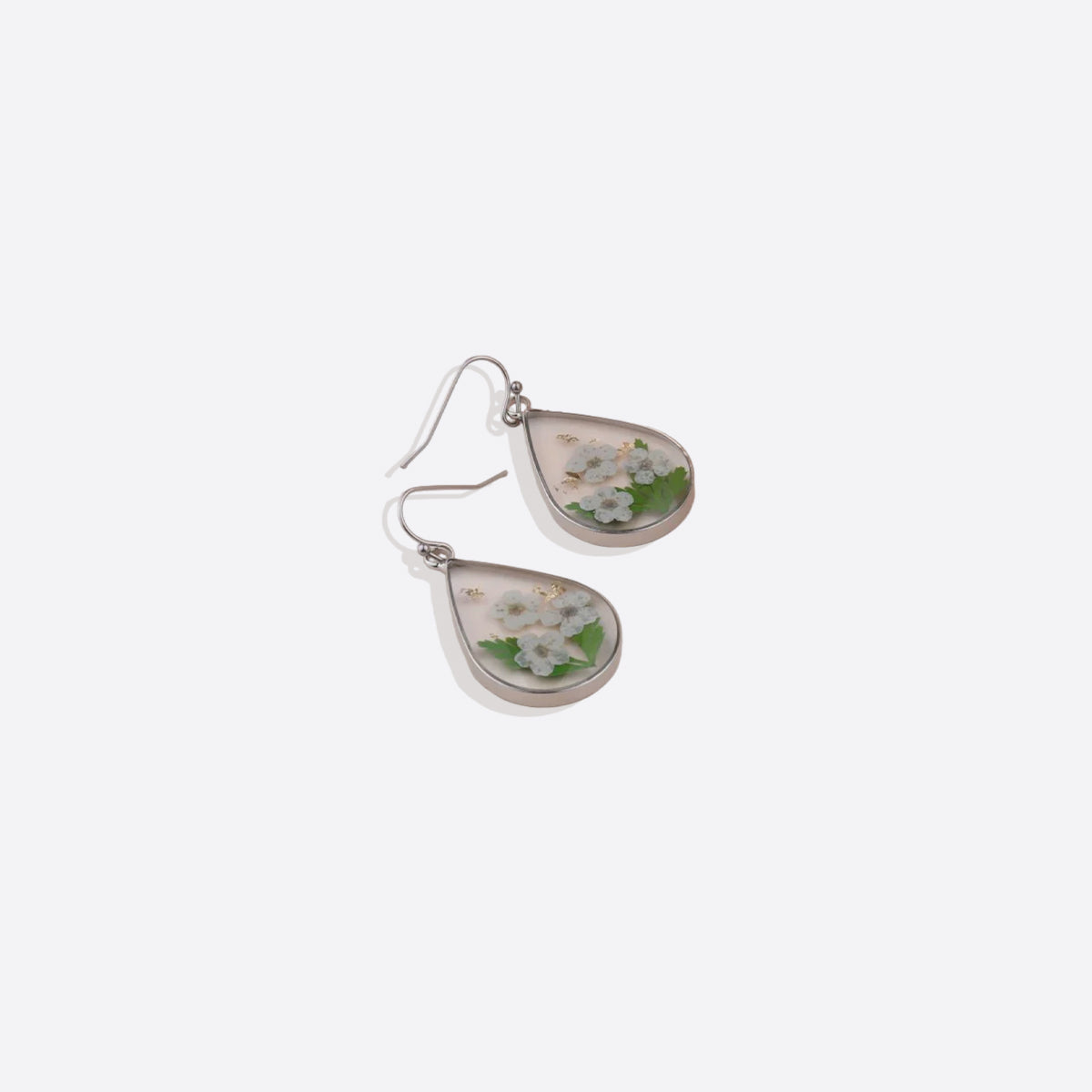 Boucles d'oreilles en fleurs de naissance pressées