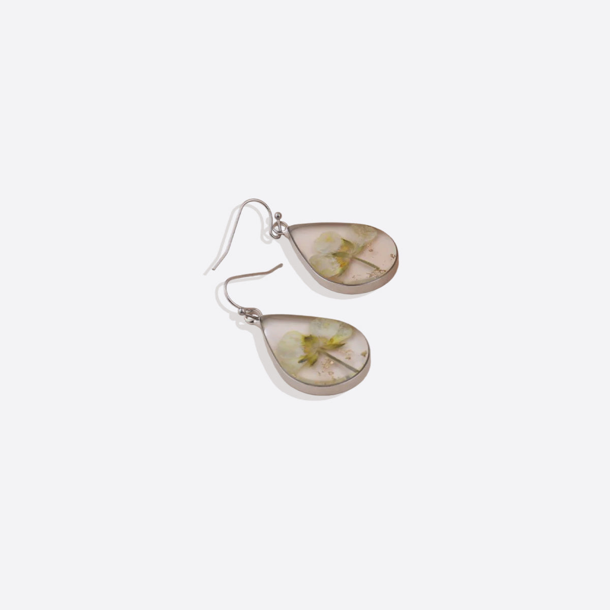 Boucles d'oreilles en fleurs de naissance pressées