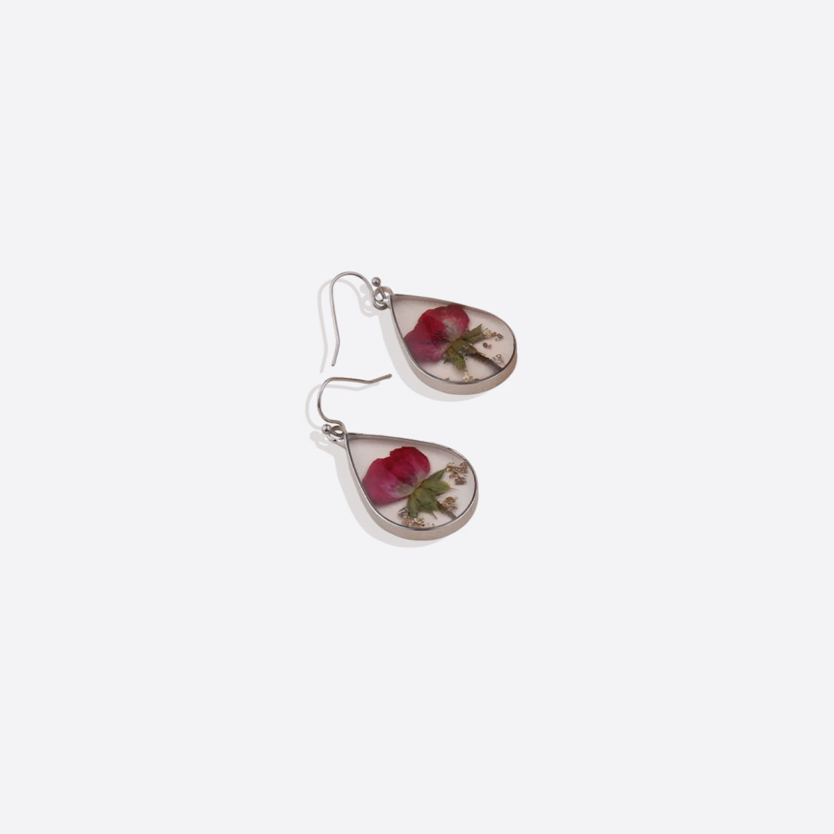 Boucles d'oreilles en fleurs de naissance pressées