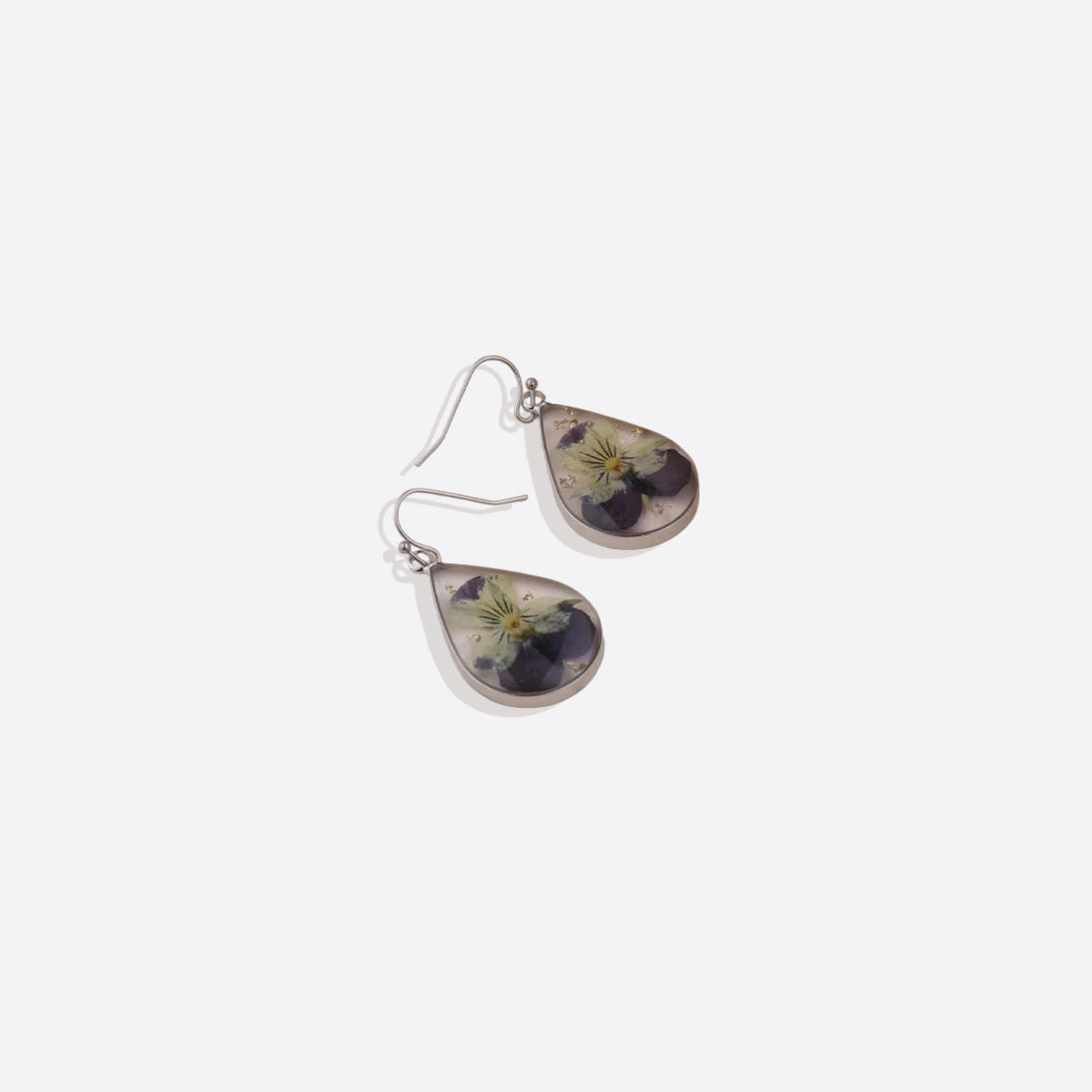 Boucles d'oreilles en fleurs de naissance pressées