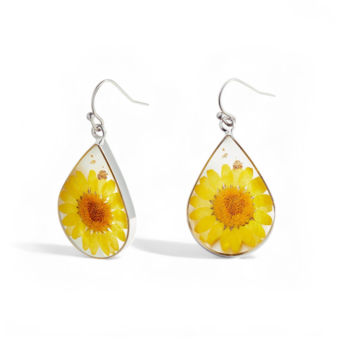 Boucles d'oreilles en fleurs de naissance pressées