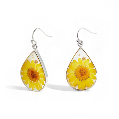 Boucles d'oreilles en fleurs de naissance pressées