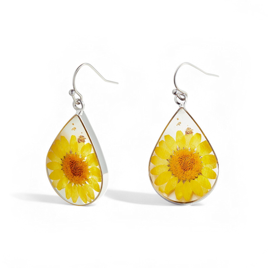 Boucles d'oreilles en fleurs de naissance pressées