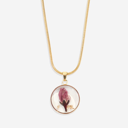 Collier de fleurs de naissance pressées