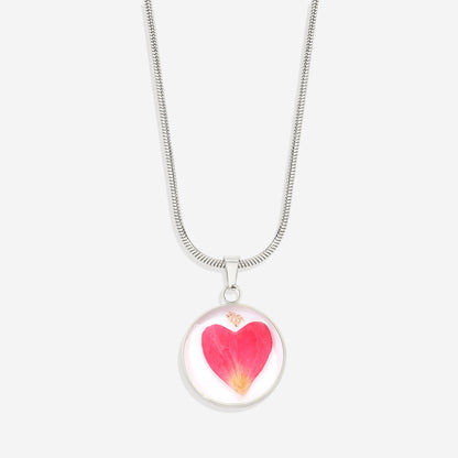 Collier de fleurs de naissance pressées