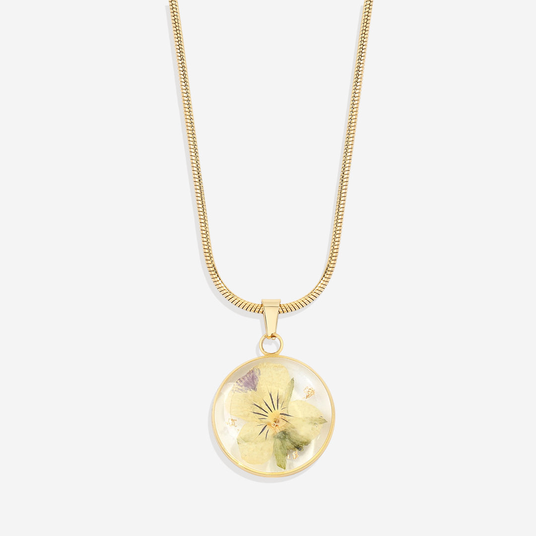 Collier de fleurs de naissance pressées