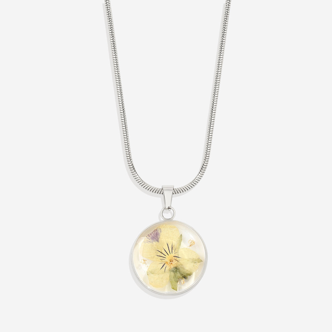 Collier de fleurs de naissance pressées