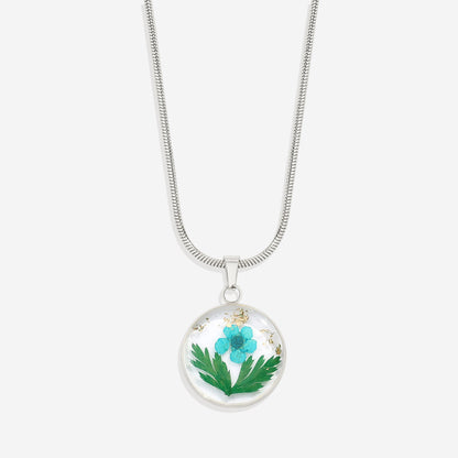 Collier de fleurs de naissance pressées