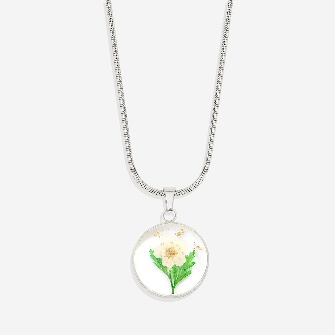 Collier de fleurs de naissance pressées