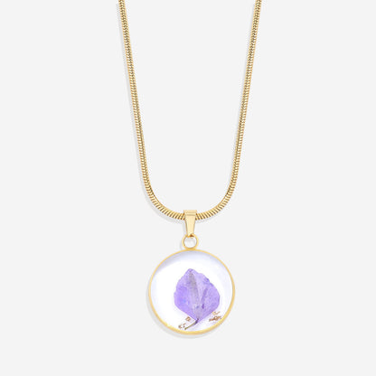 Collier de fleurs de naissance pressées