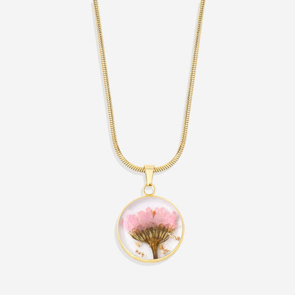 Collier de fleurs de naissance pressées