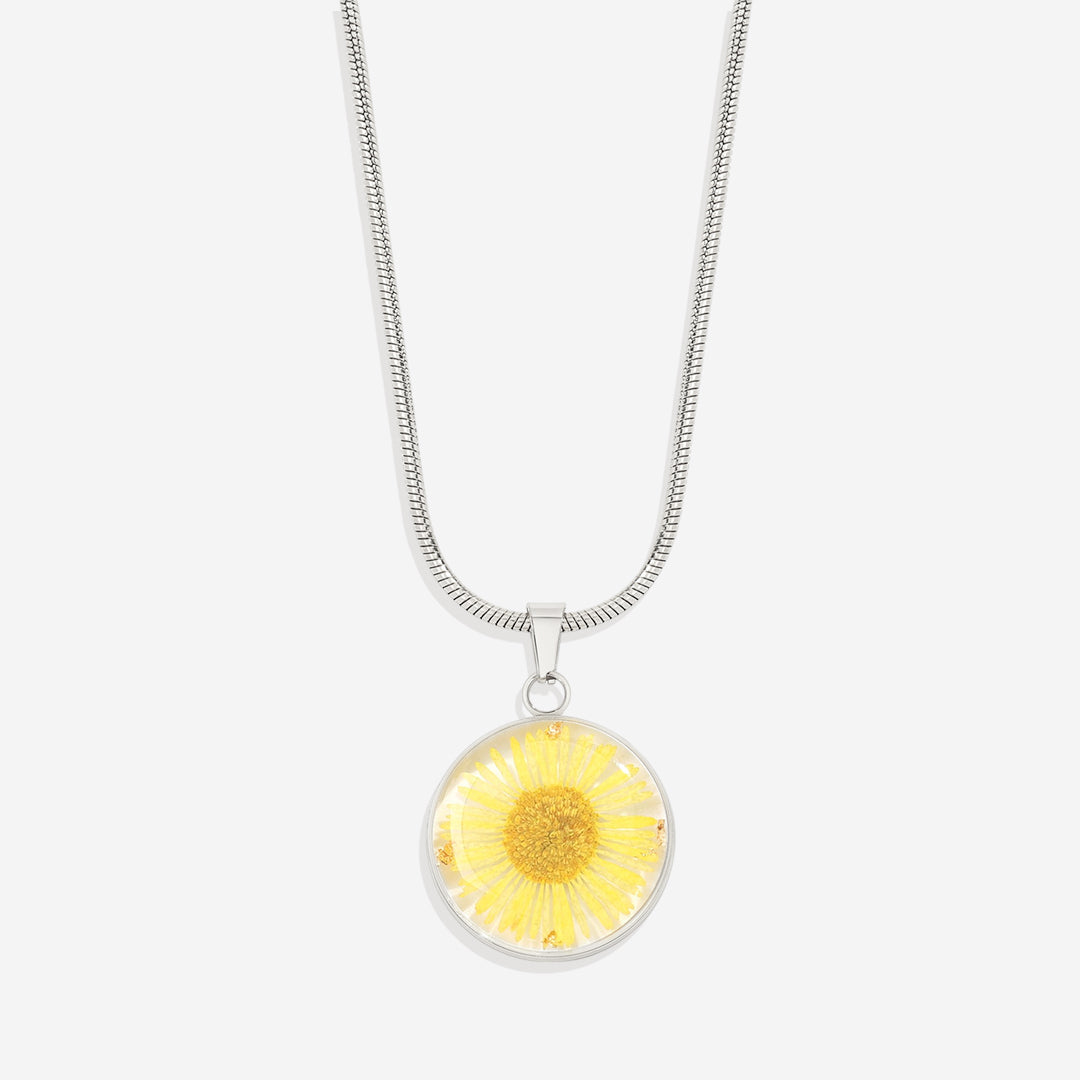 Collier de fleurs de naissance pressées
