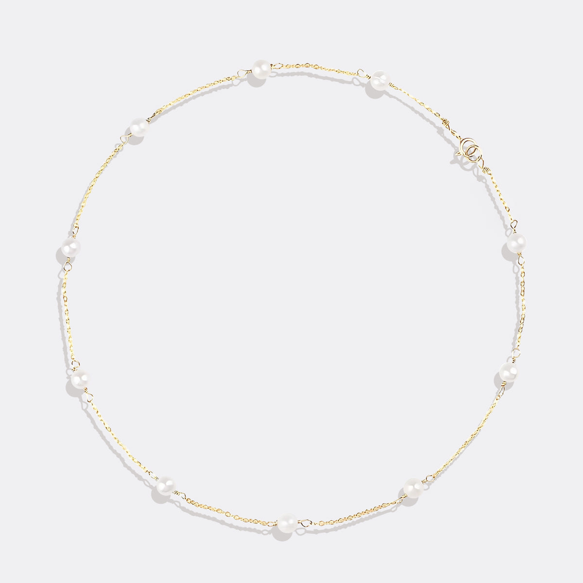 Collier ras du cou à dix perles 