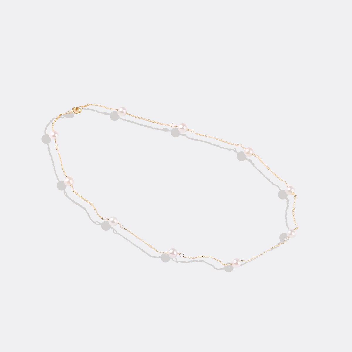 Collier ras du cou à dix perles 