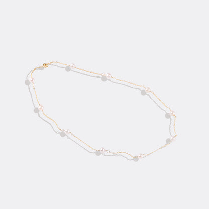 Collier ras du cou à dix perles 