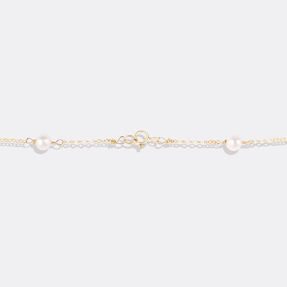 Collier ras du cou à dix perles 