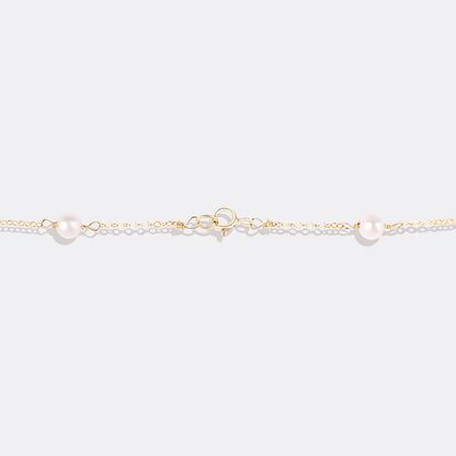 Collier ras du cou à dix perles 