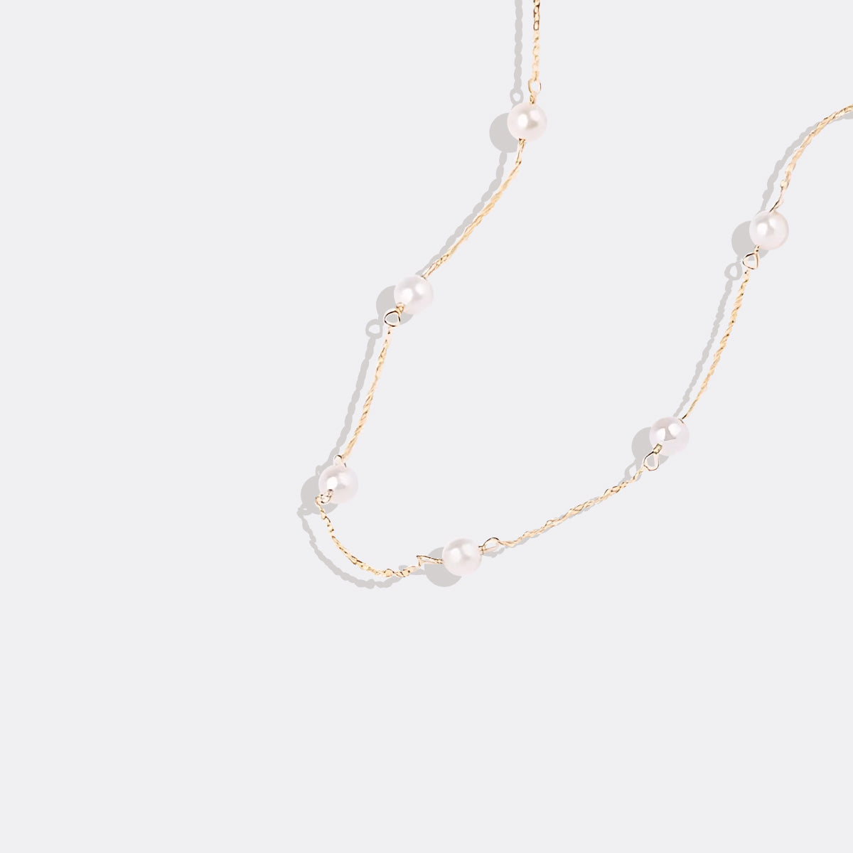 Collier ras du cou à dix perles 