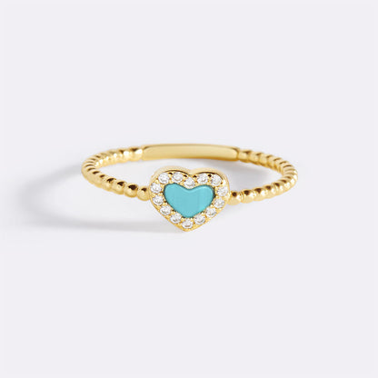 Bague en forme de cœur avec petite pierre précieuse