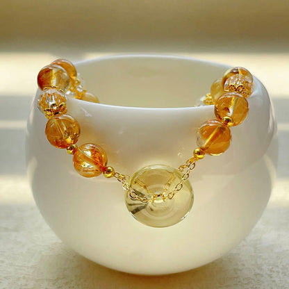 Bracelet de prospérité en cristal de citrine avec boucle de paix et pierres de Bouddha