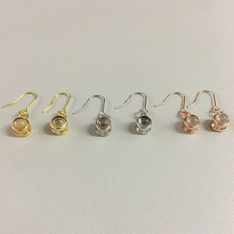 Boucles d'oreilles délicates avec projection photo personnalisée 