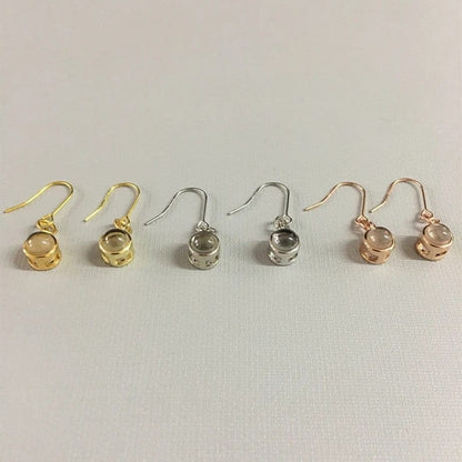 Boucles d'oreilles délicates avec projection photo personnalisée 