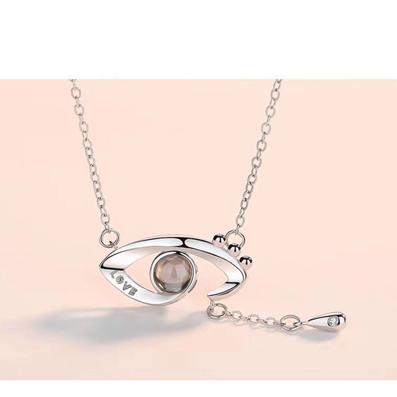 Collier avec pendentif personnalisé avec projection photo et mauvais œil