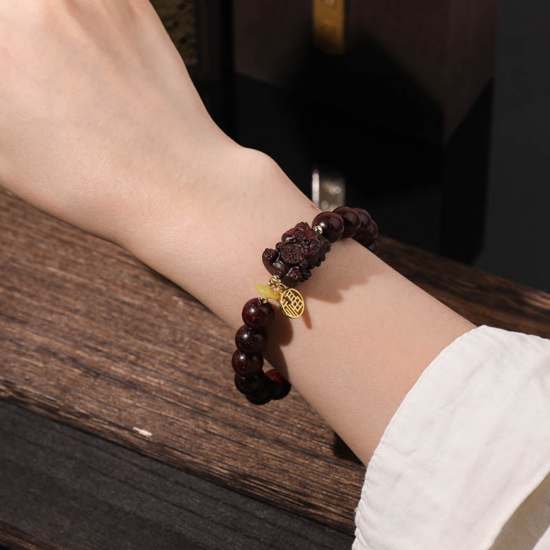 Buddha Stones Small Leaf Red Sandalwood Gold Swallower Calm Bracelet