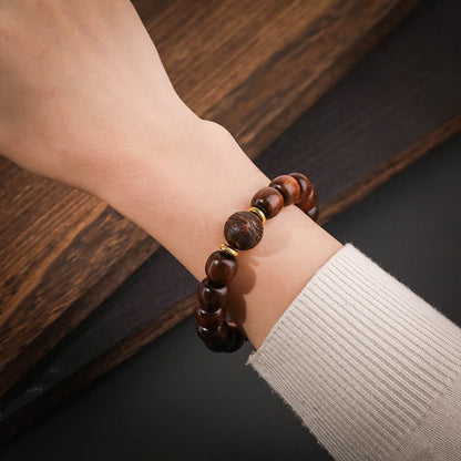 Bracelet de compassion en bois de rose naturel Buddha Stones 