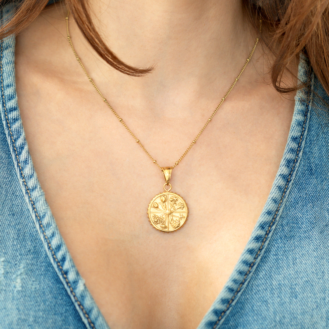 Collier pendentif pièce florale