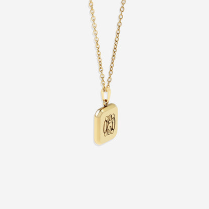 Collier pendentif portrait monogramme