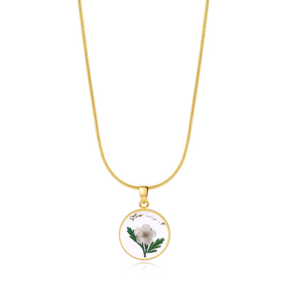 Collier de fleurs de naissance pressées