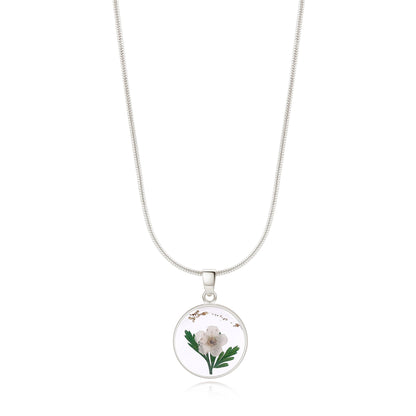 Collier de fleurs de naissance pressées
