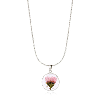 Collier de fleurs de naissance pressées