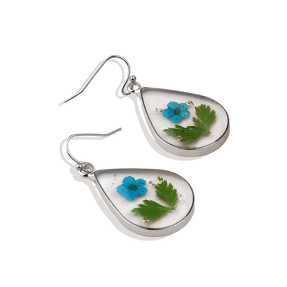 Boucles d'oreilles en fleurs de naissance pressées