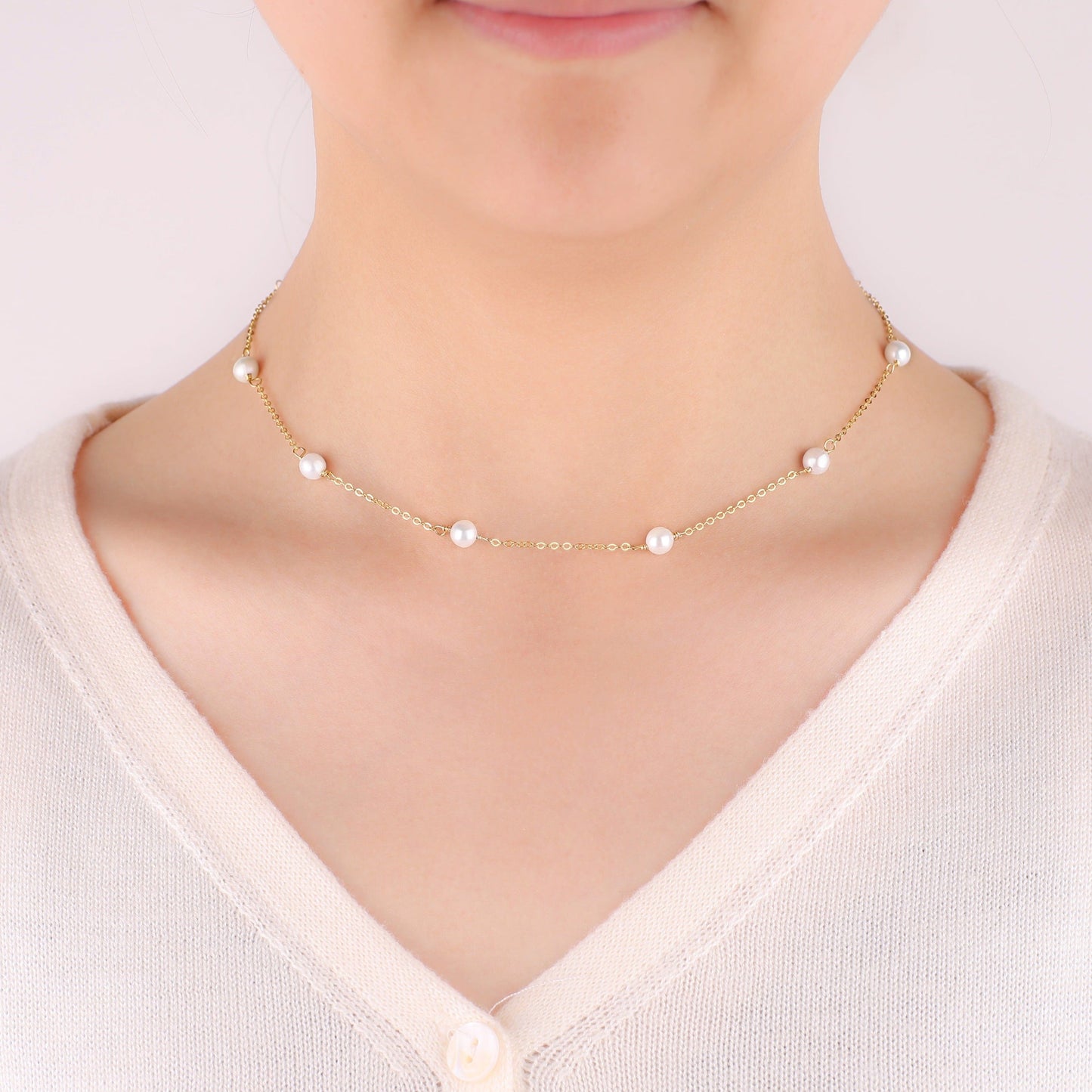 Collier ras du cou à dix perles 