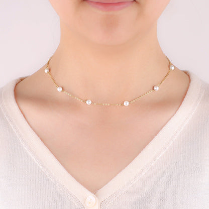 Collier ras du cou à dix perles 