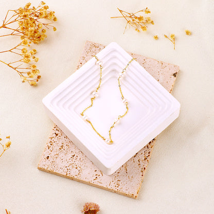 Collier ras du cou à dix perles 