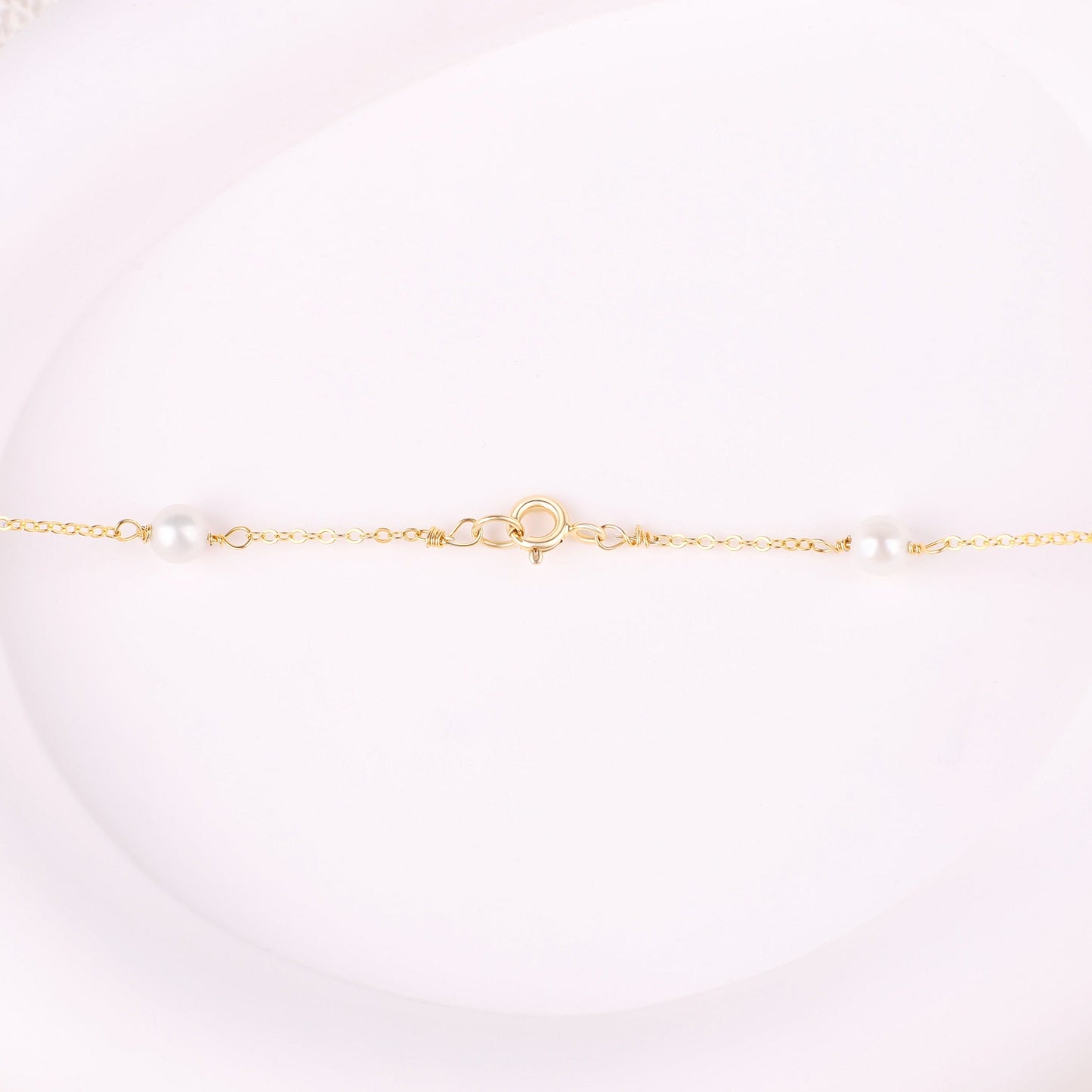 Collier ras du cou à dix perles 