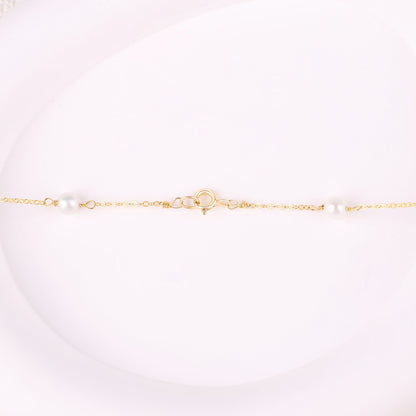Collier ras du cou à dix perles 