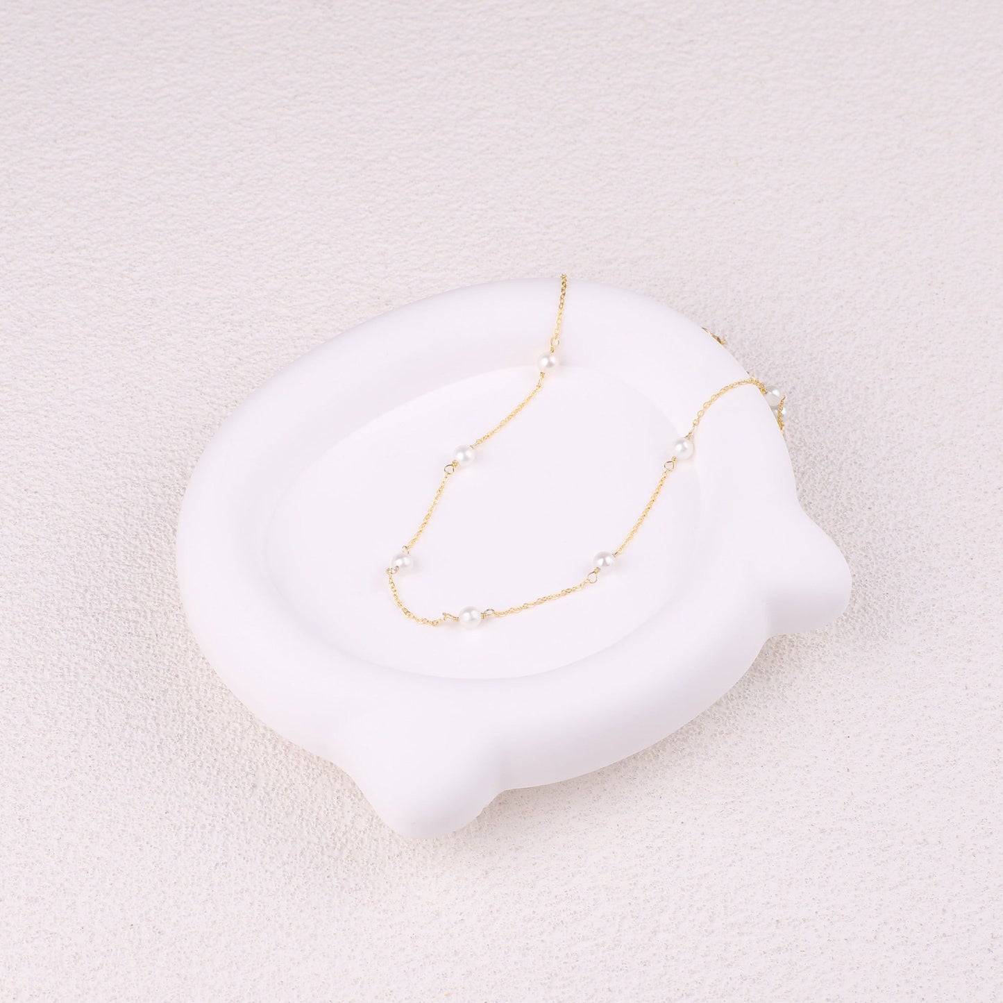 Collier ras du cou à dix perles 