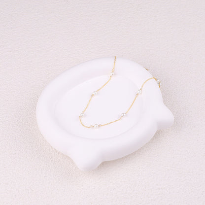 Collier ras du cou à dix perles 
