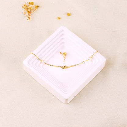 Collier ras du cou à dix perles 